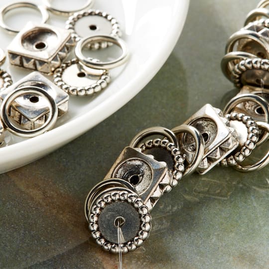 12 Pack: Sterling Silver-Plated Metal & Acrylic Ring Beads, 10mm by Bead Landing™